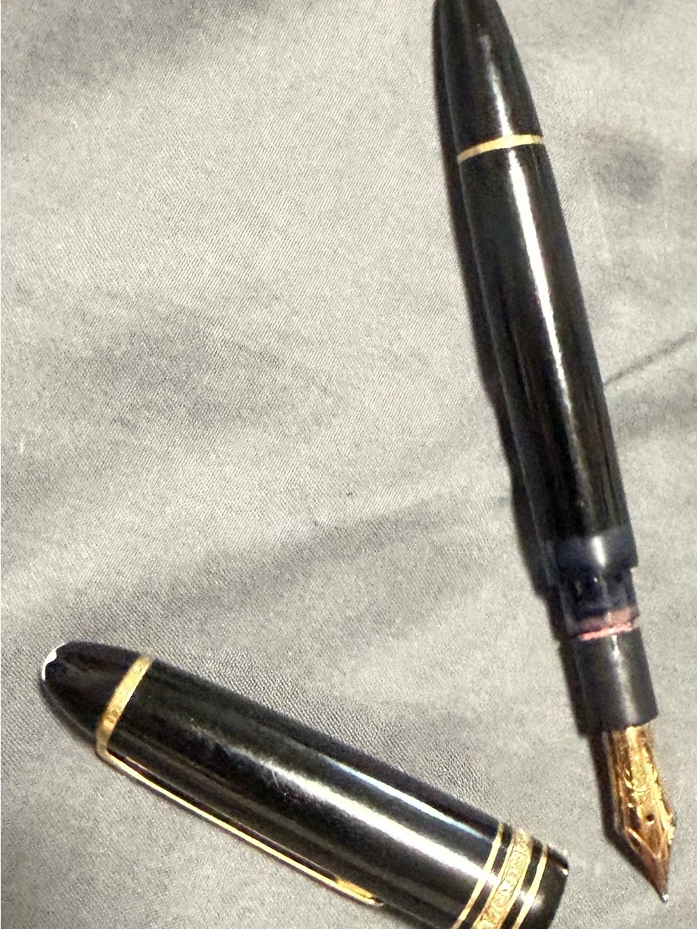 14K Montblanc Black and Gold Fountain Pen with set of scented Chanel 14K pens.